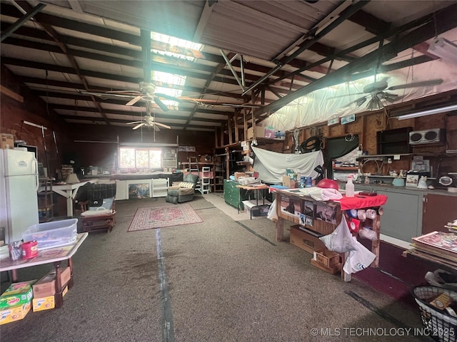 101 N 3rd St, Hartshorne, OK 74547 - misc room with ceiling fan and a workshop area
