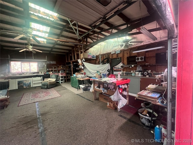 101 N 3rd St, Hartshorne, OK 74547 - miscellaneous room with a ceiling fan
