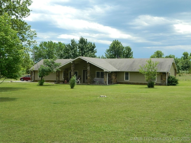 173 County Road 5305th Rd, Wynona, OK 74084 - ranch-style home featuring stone siding, a front lawn, and roof with shingles
