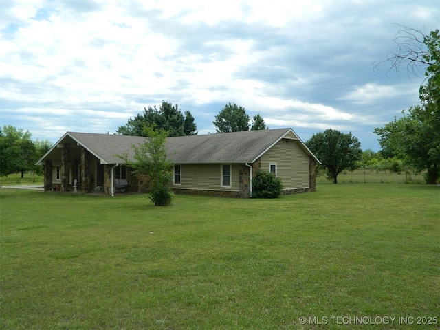 173 County Road 5305th Rd, Wynona, OK 74084 - single story home with a front yard and stone siding