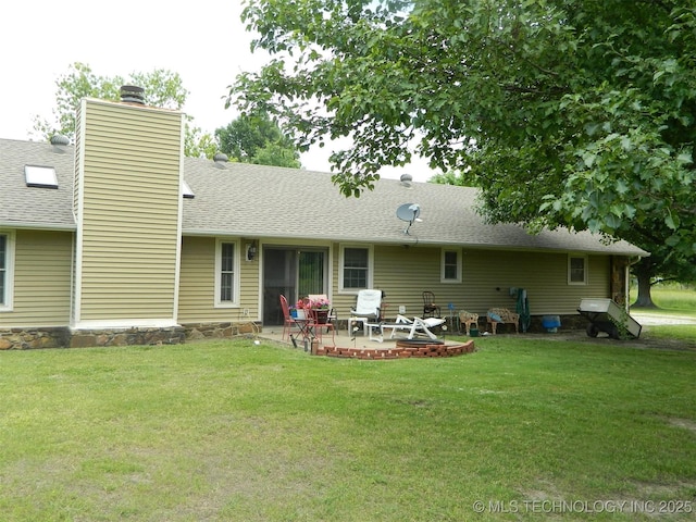 173 County Road 5305th Rd, Wynona, OK 74084 - back of property with a patio, a lawn, a chimney, and roof with shingles