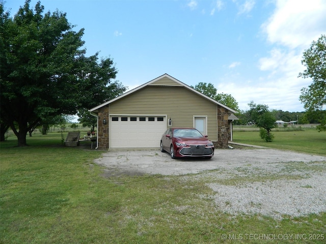 173 County Road 5305th Rd, Wynona, OK 74084 - view of side of property featuring stone siding, a lawn, and a garage