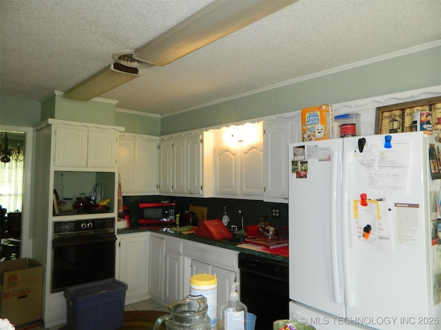 173 County Road 5305th Rd, Wynona, OK 74084 - kitchen featuring black appliances, ornamental molding, a textured ceiling, and white cabinets