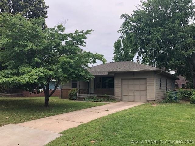 4140 S Rockford Pl, Tulsa, OK 74105 - view of front of property featuring an attached garage, a front lawn, and concrete driveway