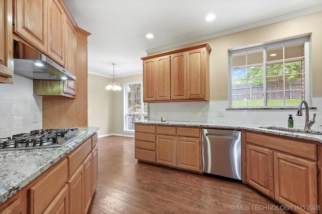 6007 E 76th Ct, Tulsa, OK 74136 - kitchen with stainless steel appliances, a sink, ornamental molding, backsplash, and recessed lighting