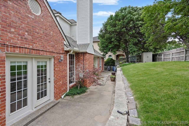 6007 E 76th Ct, Tulsa, OK 74136 - view of yard featuring a patio