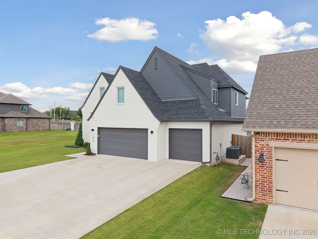 13859 S 21st Pl E, Bixby, OK 74008 - view of front of house with roof with shingles, brick siding, concrete driveway, central AC unit, and an attached garage