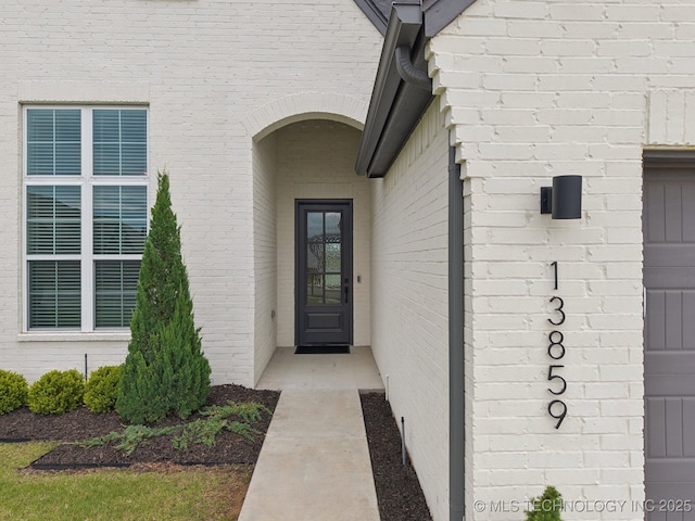 13859 S 21st Pl E, Bixby, OK 74008 - property entrance with brick siding