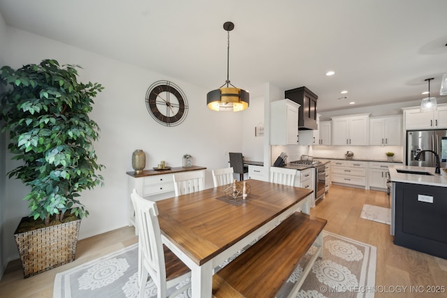 13859 S 21st Pl E, Bixby, OK 74008 - dining space with light wood-style flooring and recessed lighting