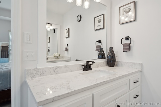 13859 S 21st Pl E, Bixby, OK 74008 - bathroom featuring vanity and a chandelier
