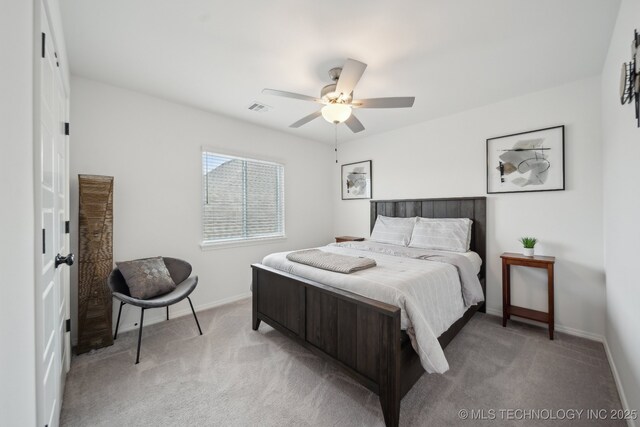 13859 S 21st Pl E, Bixby, OK 74008 - bedroom with light colored carpet, baseboards, and a ceiling fan