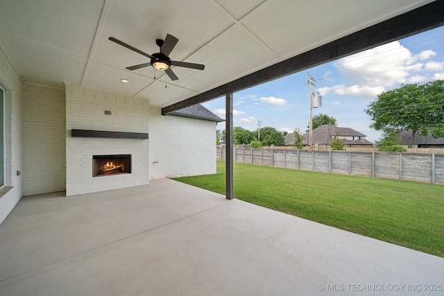 13859 S 21st Pl E, Bixby, OK 74008 - view of patio / terrace with an outdoor brick fireplace and ceiling fan