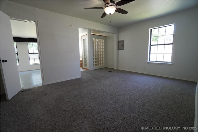 8304 E 124th E Ave, Owasso, OK 74055 - carpeted spare room with ceiling fan, electric panel, and baseboards
