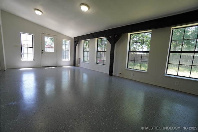 8304 E 124th E Ave, Owasso, OK 74055 - empty room featuring plenty of natural light, baseboards, and vaulted ceiling