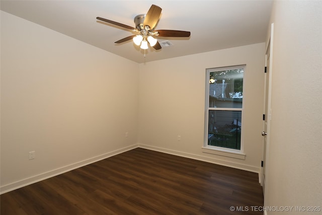 805 N Ridgeway St, Sapulpa, OK 74066 - empty room with dark wood-style floors, baseboards, and a ceiling fan