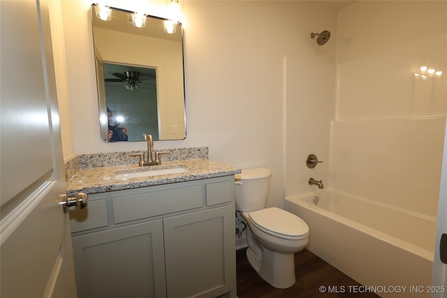 805 N Ridgeway St, Sapulpa, OK 74066 - full bathroom with vanity, shower / bathtub combination, and wood finished floors