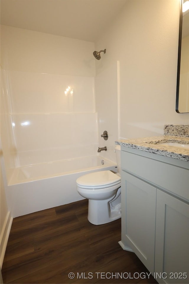 805 N Ridgeway St, Sapulpa, OK 74066 - bathroom with vanity, wood finished floors, and  shower combination