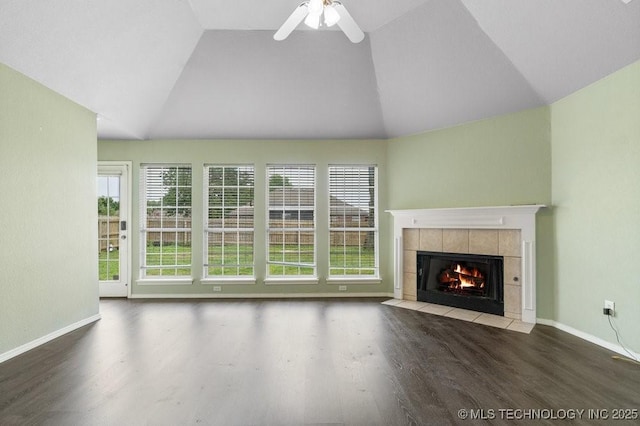 20001 E 46th St, Broken Arrow, OK 74014 - unfurnished living room featuring a fireplace, wood finished floors, baseboards, and high vaulted ceiling