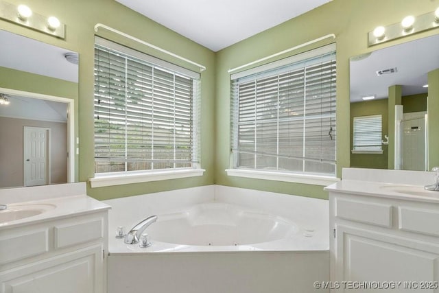 20001 E 46th St, Broken Arrow, OK 74014 - bathroom with two vanities and a jetted tub