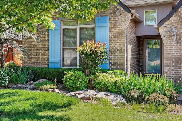 10935 S 77th Pl, Tulsa, OK 74133 - property entrance with brick siding and stucco siding