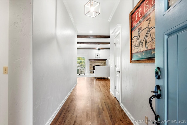 10935 S 77th Pl, Tulsa, OK 74133 - hall featuring crown molding, wood finished floors, and baseboards