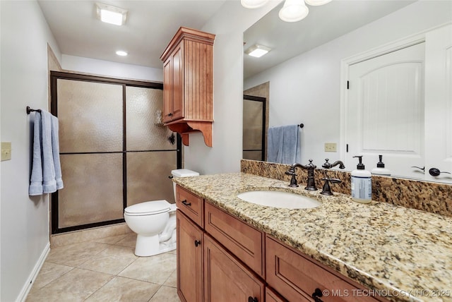 10935 S 77th Pl, Tulsa, OK 74133 - full bathroom with vanity, a stall shower, toilet, tile patterned floors, and baseboards
