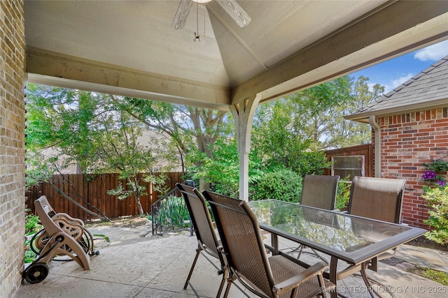 10935 S 77th Pl, Tulsa, OK 74133 - fenced backyard featuring outdoor dining area, ceiling fan, and a patio area