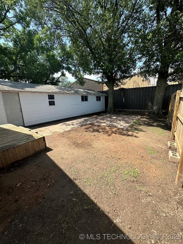105 S B, Davis, OK 73030 - view of yard featuring a deck