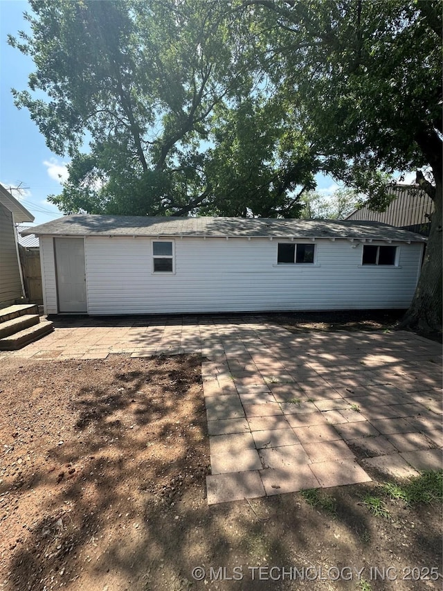 105 S B, Davis, OK 73030 - rear view of property featuring a patio