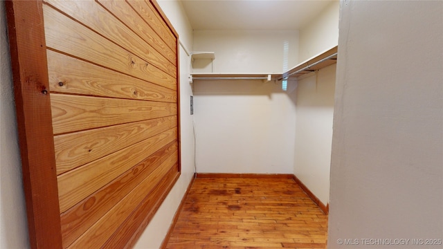 105 S B, Davis, OK 73030 - spacious closet featuring wood finished floors