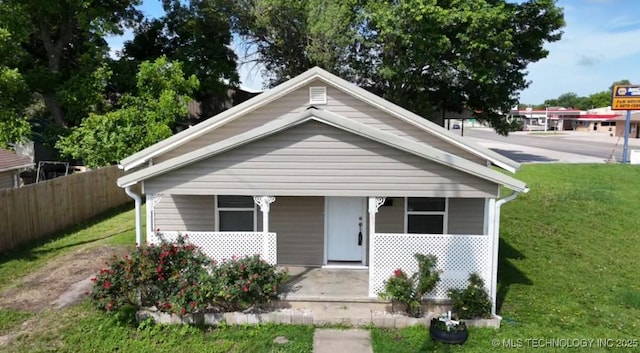 105 S B, Davis, OK 73030 - bungalow-style house with a porch