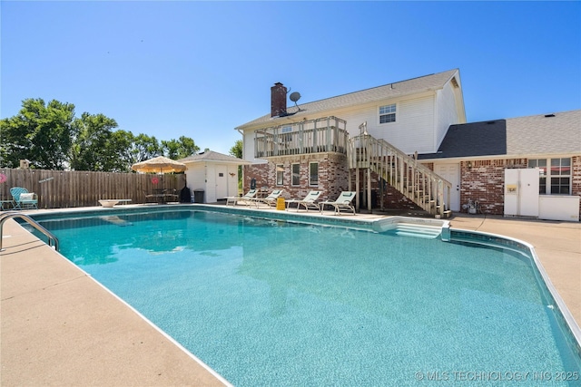 1608 Blue Stem Rd, Fort Gibson, OK 74434 - view of swimming pool featuring stairway and a patio