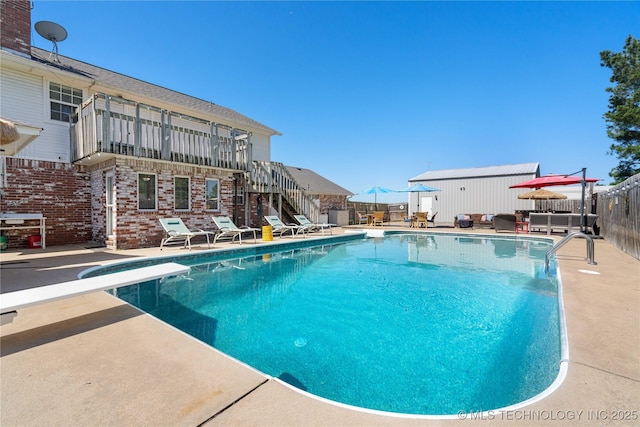 1608 Blue Stem Rd, Fort Gibson, OK 74434 - view of pool with stairs, a patio area, a diving board, and a fenced backyard
