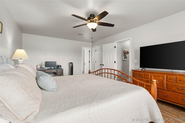 1608 Blue Stem Rd, Fort Gibson, OK 74434 - bedroom featuring wood finished floors and a ceiling fan