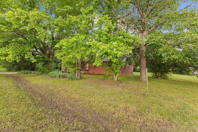 709 N Maple, Konawa, OK 74849 - view of grassy yard