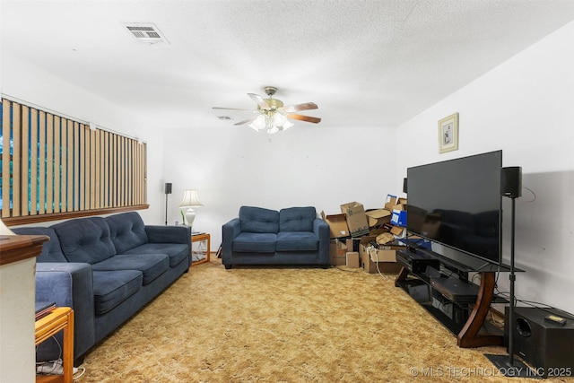709 N Maple, Konawa, OK 74849 - living room with carpet and a ceiling fan