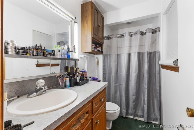 709 N Maple, Konawa, OK 74849 - bathroom with vanity, toilet, and curtained shower