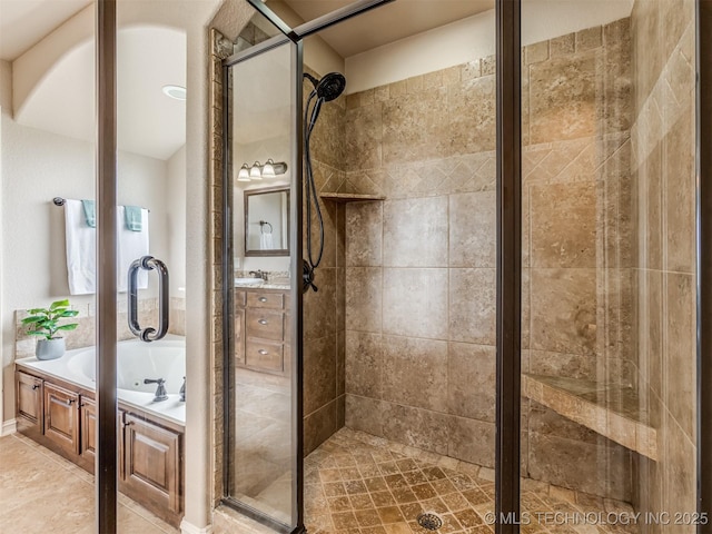 5909 E 139th St, Collinsville, OK 74021 - bathroom featuring a stall shower, a garden tub, vanity, and tile patterned floors