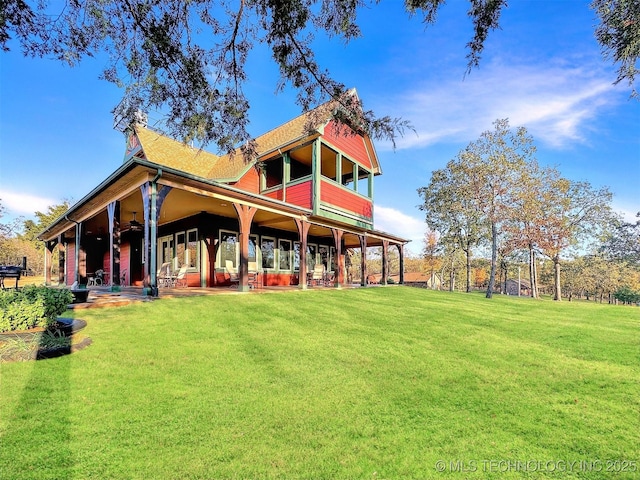 20965 W 921st Rd, Cookson, OK 74427 - rear view of property featuring a yard and ceiling fan
