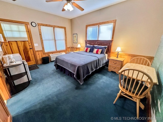 20965 W 921st Rd, Cookson, OK 74427 - bedroom with dark colored carpet, a wainscoted wall, wooden walls, ceiling fan, and an AC wall unit