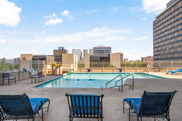 1502 S Boulder Ave Unit 16Cd, Tulsa, OK 74119 - community pool with a patio