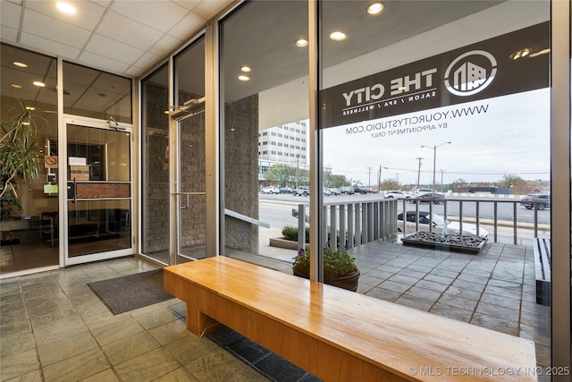 1502 S Boulder Ave Unit 16Cd, Tulsa, OK 74119 - building lobby featuring expansive windows and recessed lighting