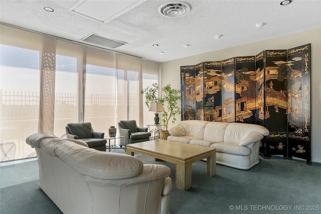 1502 S Boulder Ave Unit 16Cd, Tulsa, OK 74119 - building lobby featuring a textured ceiling