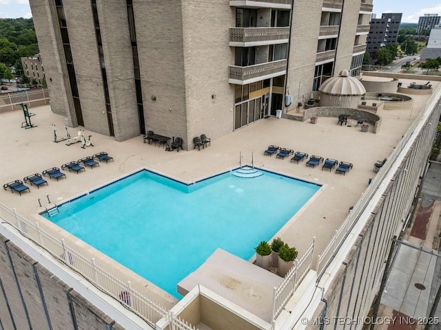 1502 S Boulder Ave Unit 16Cd, Tulsa, OK 74119 - community pool with a patio area