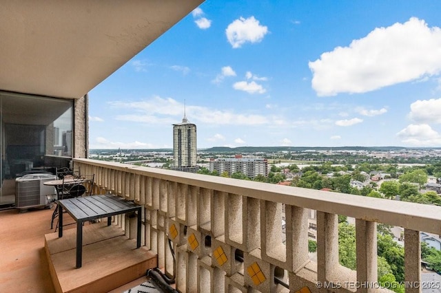 1502 S Boulder Ave Unit 16Cd, Tulsa, OK 74119 - balcony with cooling unit and a city view