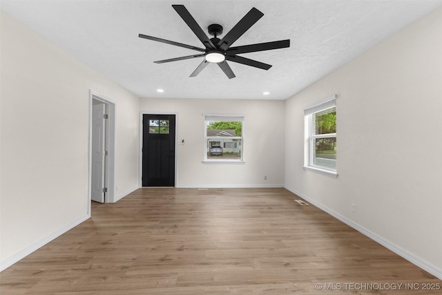 524 W 18th, Ada, OK 74820 - entryway featuring ceiling fan, light wood-type flooring, recessed lighting, and baseboards