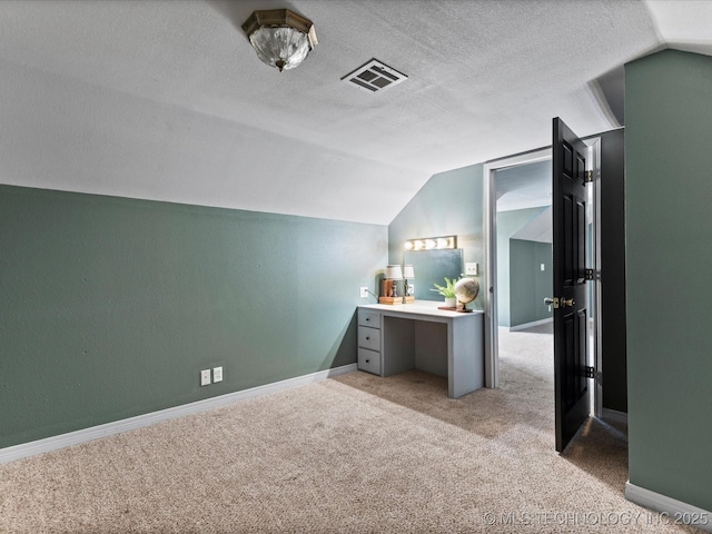 324 2019th Rd, Bartlesville, OK 74003 - bathroom featuring vaulted ceiling, baseboards, vanity, and a textured ceiling