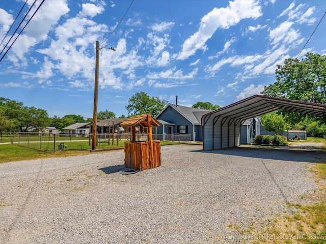 324 2019th Rd, Bartlesville, OK 74003 - view of front of property with driveway and a carport