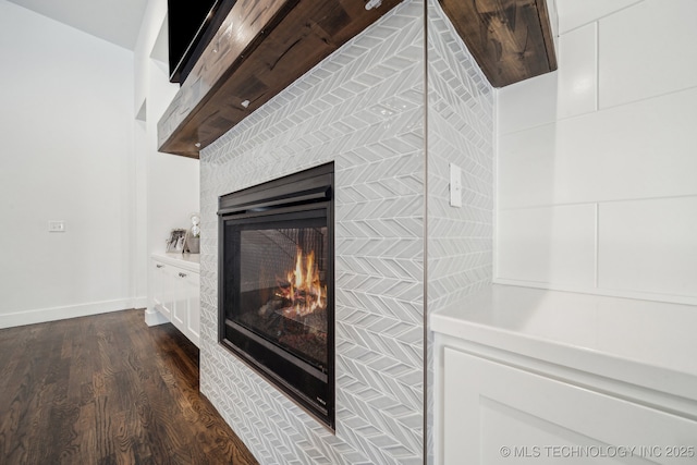 1038 E 38th Pl, Tulsa, OK 74105 - detailed view of a multi sided fireplace, wood finished floors, and baseboards