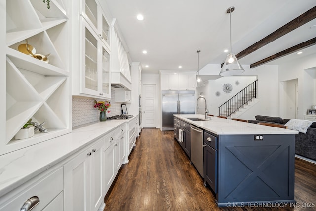 1038 E 38th Pl, Tulsa, OK 74105 - kitchen featuring stainless steel appliances, a sink, white cabinetry, light stone countertops, and recessed lighting